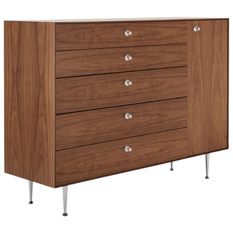 The Nelson Thin Edge Chest Cabinet from Herman Miller in walnut with right orientation from an angle.