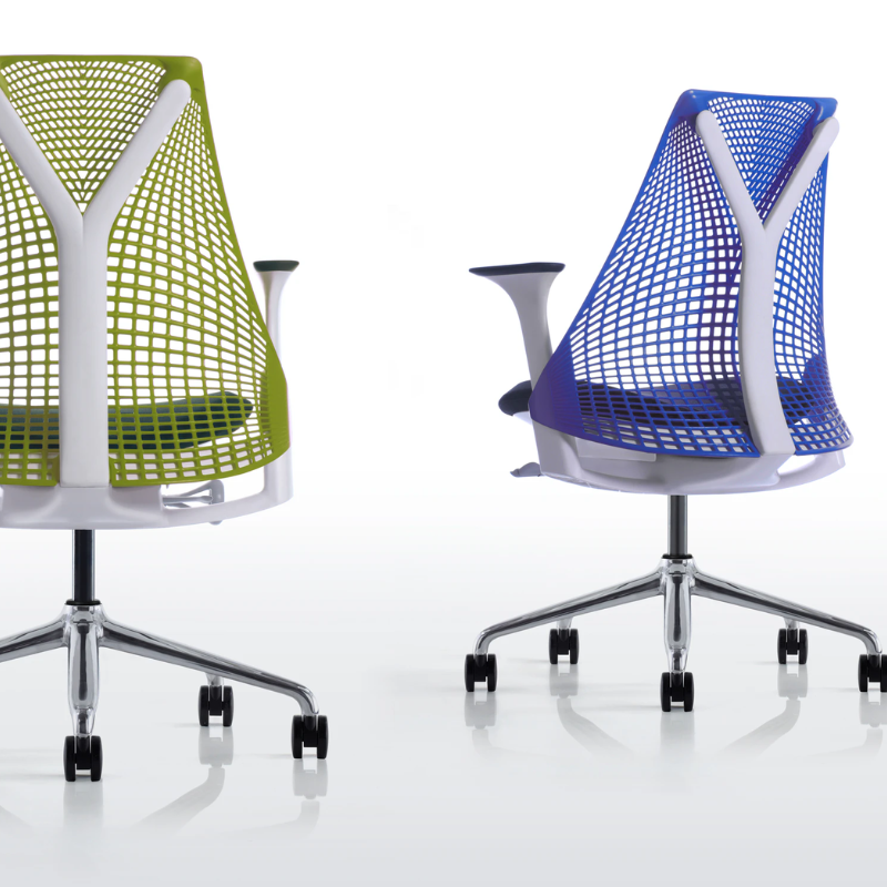 The Sayl Chair from Herman Miller in berry blue and green apple.