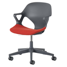 The Zeph Multipurpose Chair with Arms from Herman Miller carbon shell with blaze seat pad.