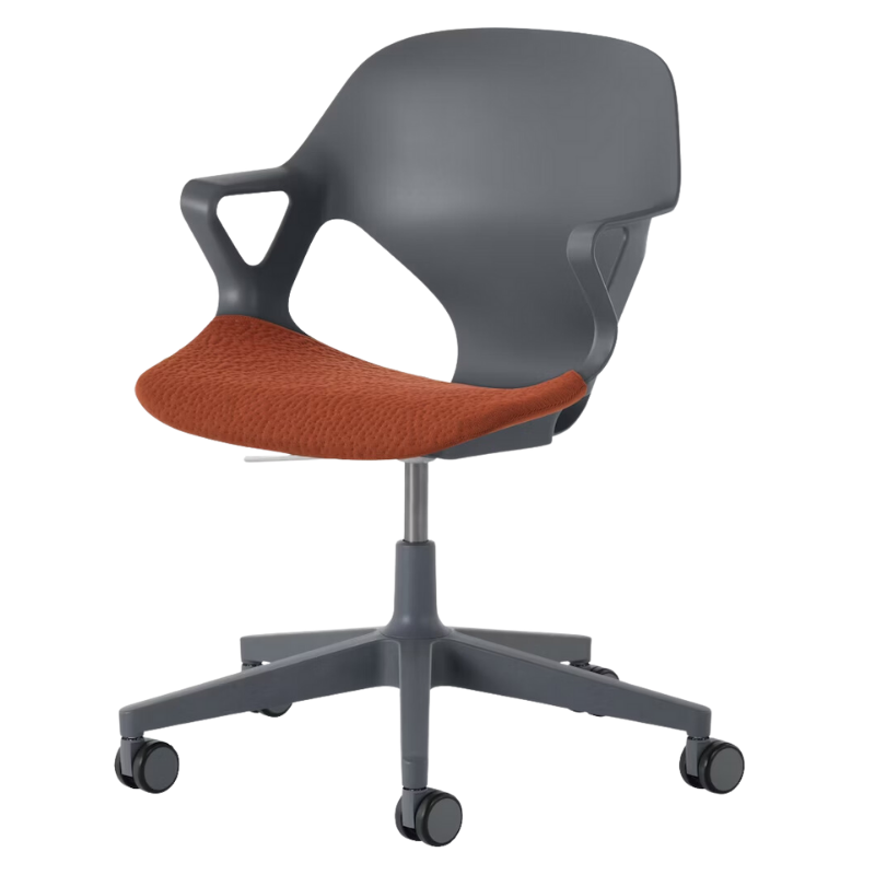 The Zeph Multipurpose Chair with Arms from Herman Miller carbon shell with cayenne seat pad.