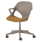 The Zeph Multipurpose Chair with Arms from Herman Miller cocoa shell with mustard seed seat pad.