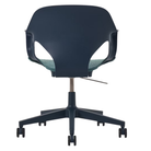 The Zeph Multipurpose Chair with Arms from Herman Miller nightfall shell with glacier seat pad from the back.