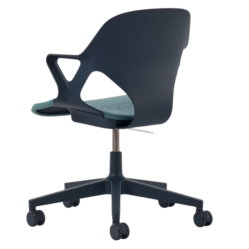 The Zeph Multipurpose Chair with Arms from Herman Miller nightfall shell with glacier seat pad from the rear.