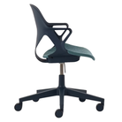 The Zeph Multipurpose Chair with Arms from Herman Miller nightfall shell with glacier seat pad from the side.