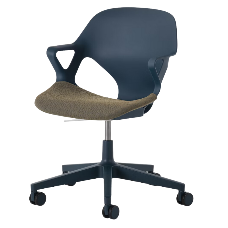 The Zeph Multipurpose Chair with Arms from Herman Miller nightfall shell with moss seat pad.