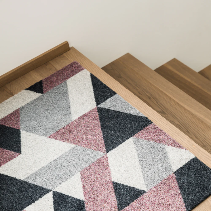 The Blåne Doormat from Heymat in spring in a living space.