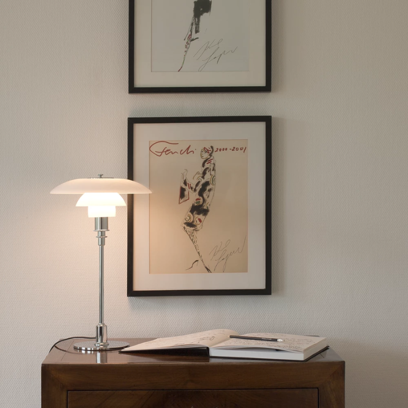 The PH 3/2 Glass Table Lamp from Louis Poulsen in a study.