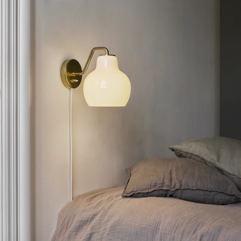 The VL Ring Crown Wall Light from Louis Poulsen in a bedroom.