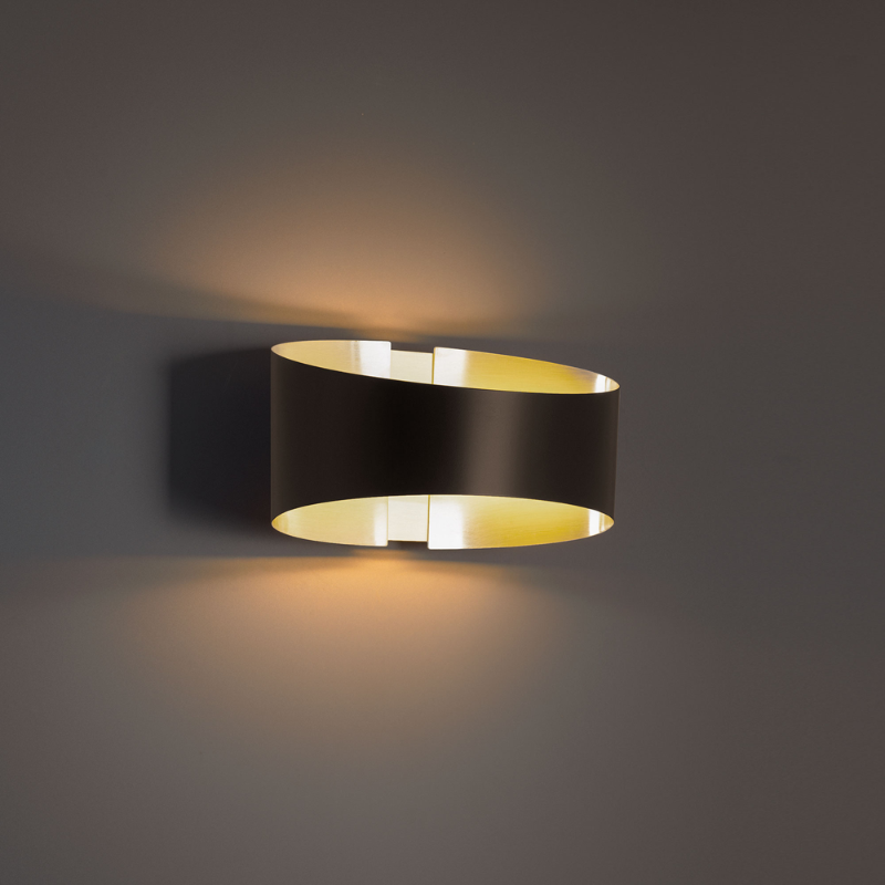 The Swerve Wall Sconce from Modern Forms in a living space.