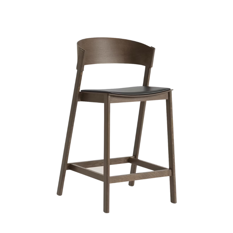 Muuto cover counter stool in stained dark brown with black refine leather upholstered seat.