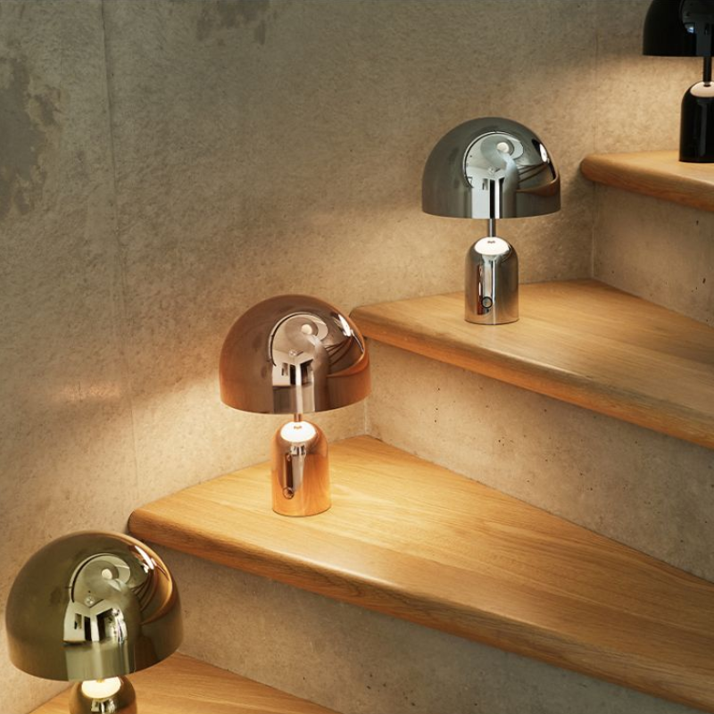 The Bell Portable LED from Tom Dixon on a staircase.