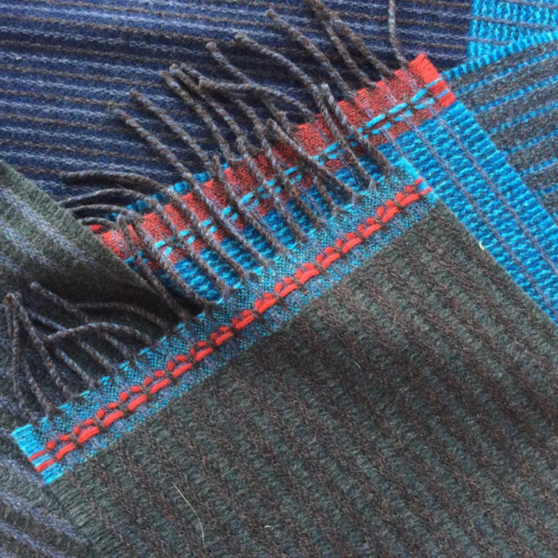 The Chatham Scarf from Wallace & Sewell in earth (color) in a close up.