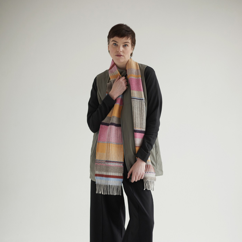 The Maela Scarf from Wallace & Sewell in bubblegum being worn.