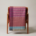 The Shetland Tweed Throw from Wallace & Sewell in Rona color on a chair.