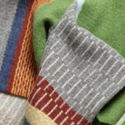 The Strathay Scarf from Wallace & Sewell in pea close up.