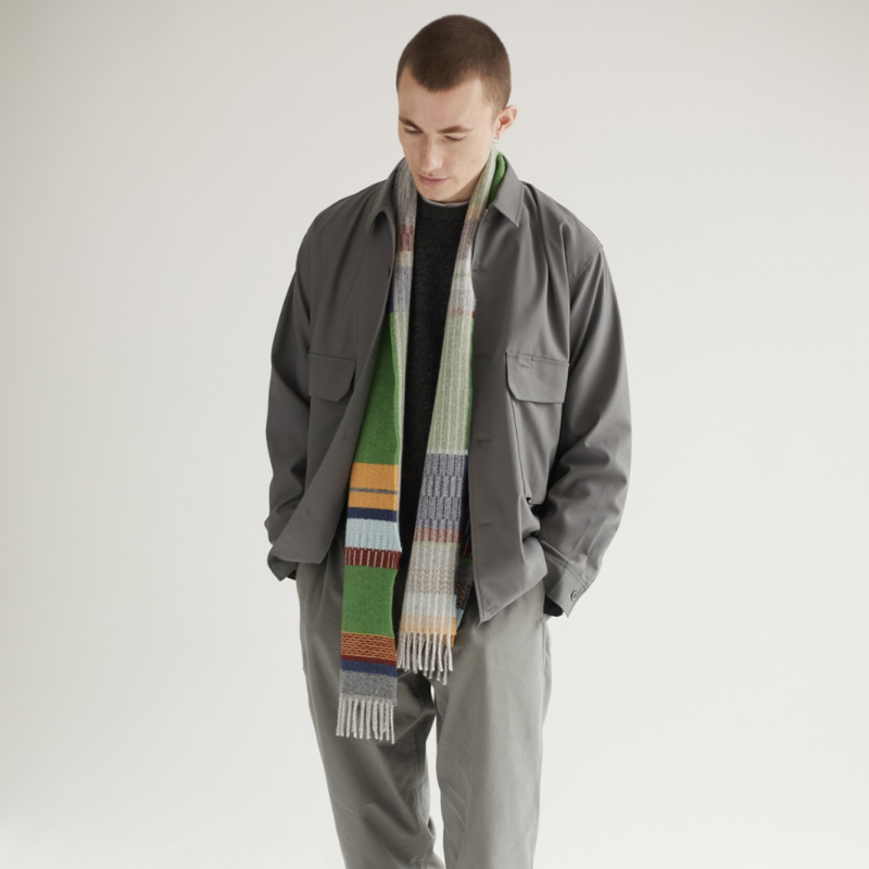 The Strathay Scarf from Wallace & Sewell in pea lifestyle on a man.