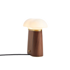 The Nova Table Lamp by Woud in walnut from a side view.