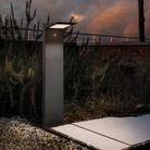 The Solar Bollard from Zafferano illuminating an outdoor pathway.