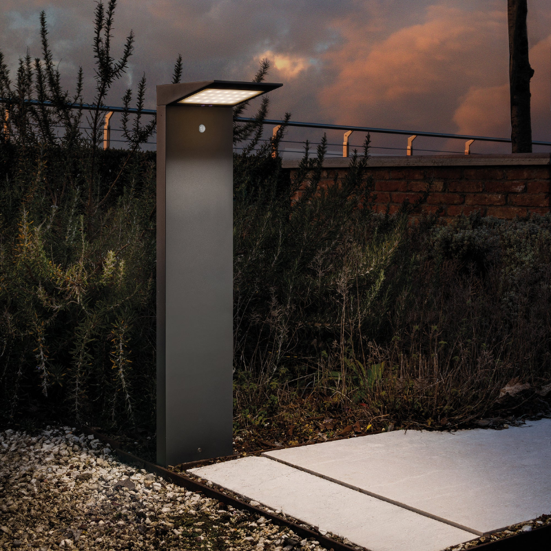 The Solar Bollard from Zafferano illuminating an outdoor pathway.