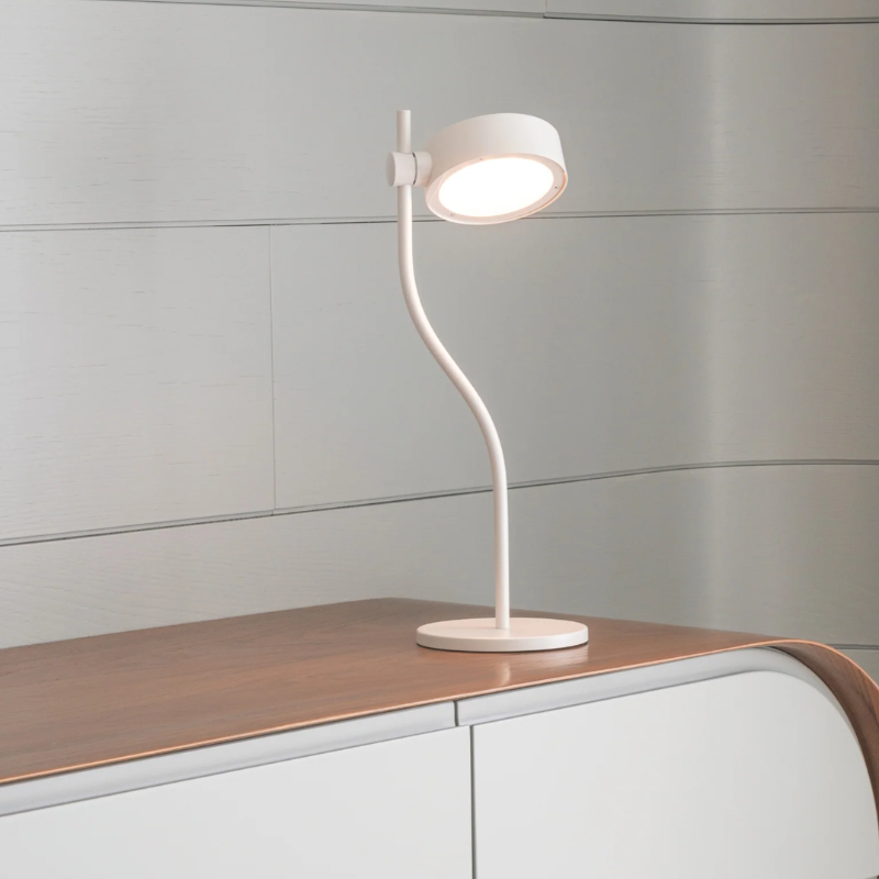 The Super O Table Lamp from Zafferano in a living room.