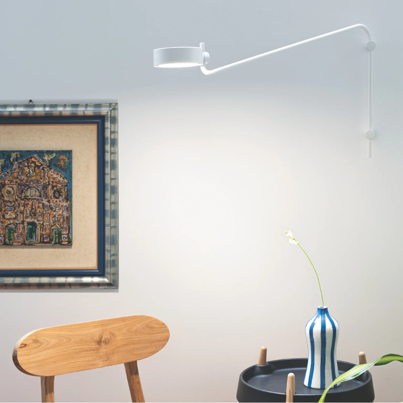 The long Super O Wall Lamp from Zafferano in an office.